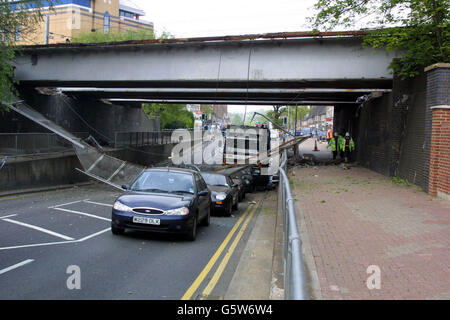 Debris under the bridge at Potters Bar, Hertfordshire after the train crash at the station. A West Anglia Great Northern spokeswoman said it was thought that about 20 to 30 people were in the carriage that hit the bridge - 5 passengers are reported dead and several people injured. Stock Photo