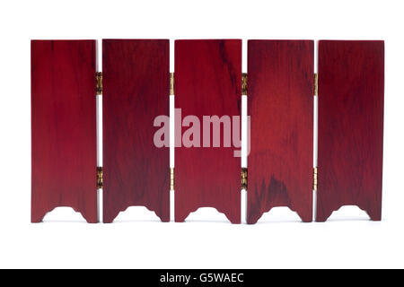 Partition screen wall wood asian old oriental style with classic gold plate in center Stock Photo