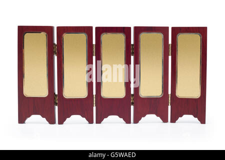 Partition screen wall wood asian old oriental style with classic gold plate in center Stock Photo