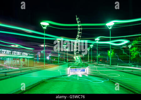 A night time urban scene of the entrance to the Millennium Square car park in the Ciry of Bristol, England. Stock Photo