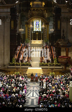 Britain's Queen Elizabeth II (blue coat) in St Paul's Cathedral, London, for a Service of Thanksgiving to celebrate her Golden Jubilee. Later, she went on to a banquet at Guildhall and to watch a parade in The Mall. * Monday night saw more than one million people gather in central London to hear the Party in the Palace concert, and to watch a spectacular firework display. Stock Photo