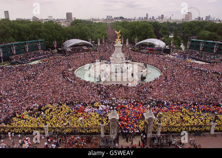 The scene from the roof of Buckingham Palace as crowds gather to watch the Jubilee Flypast of 27 aircraft including the Red Arrows and Concorde fly above The Mall to mark the Queen's Golden Jubilee. It was the largest formation flight over London since 1981. * Up to one million people are thought to have been in central London for the day of celebration. Stock Photo