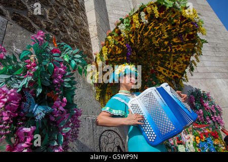 Lady with accordion playing music performance at Montmartre, Paris, France Stock Photo