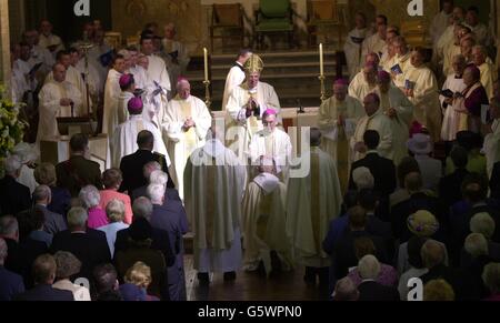 The Ordination of new armed Forces Bishop, Thomas Burns from Belfast (kneeling) at Cathedral Church of Saint Michael Aldershot. Mgr Burns, who was the Principal Roman Catholic Chaplain and Vicar General for the Royal Navy, succeeds Bishop Francis Walmsley, 75. * who has been Bishop of the Forces since 1979 and has now retired. Stock Photo