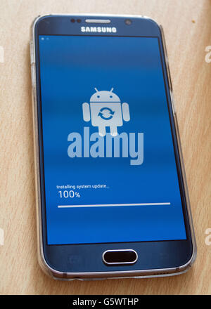 A Samsung Galaxy S6 is updated to the latest android software Stock Photo