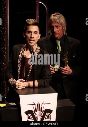 Russell Kane and Paul Weller on stage during the 2013 NME Awards, at the Troxy, London. Stock Photo