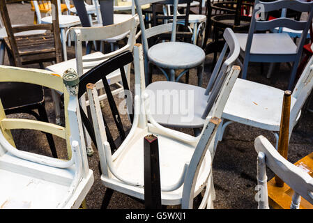 Collection of different used old chairs Stock Photo