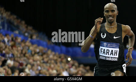 Great Britain's Mo Farah on his way to winning the men's 3,000metres during the British Athletics Birmingham Grand Prix at the National Indoor Arena, Birmingham. Stock Photo