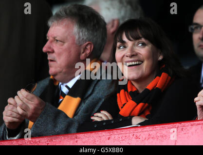 Soccer - William Hill Scottish Cup - Sixth Round - Dundee v Dundee United - Dens Park. TV presenter Lorraine Kelly smiles as she sits in the stands during the Scottish Cup, Sixth Round at Dens Park, Dundee. Stock Photo