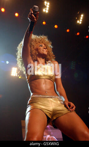 Singer Beyonce Knowles from the US R'n'B band Destiny's Child performing on stage at the London Arena in Docklands, London. Stock Photo