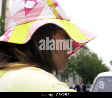 Model and actress Liz Hurley returning to her home in London. A statement issued on behalf of her former boyfriend Steve Bing, says that recently conducted tests have shown that he is the biological father of her son, Damian Charles, who was born on April 4. Stock Photo