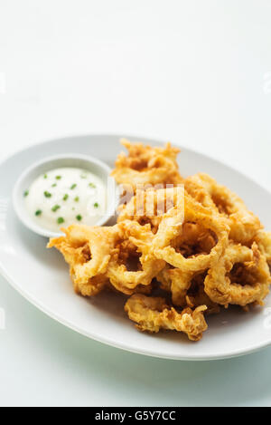 calamares calamari fried battered squid rings seafood snack with aioli sauce Stock Photo