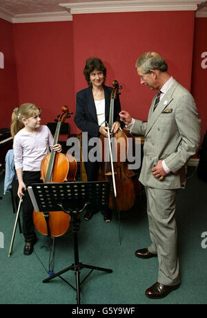 The Prince of Wales visits staff and pupils at the William Mathies Music Centre in Caernarfon where he was watching them perform at a concert in St Mary's Church. It was his third engagement of the day having visited Plas Mawr, a restored Elizabethan town house in the historic north Wales town of Conwy, where he was meeting local business leaders and the Euro DPC factory, in Llanberis, which produces healthcare diagnostic products and won the Queen's Award for Export Achievement four years ago. The visit was the Prince's last leg of his traditional three-day summer tour of the Principality. Stock Photo