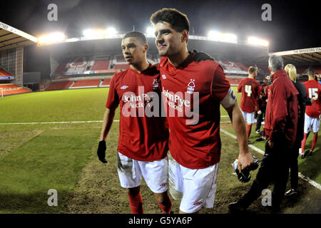 Soccer - FA Youth Cup - Sixth Round - Nottingham Forest v Bolton Wanderers - The City Ground. Nottingham Forest's Kieran Fenton and Jordan Samuels-Palmer celebrate their side's victory at the final whistle. Stock Photo