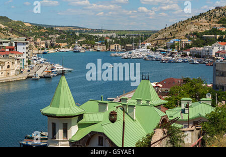 Balaklava is popular Crimean resort. Bay former submarine base. Stock Photo