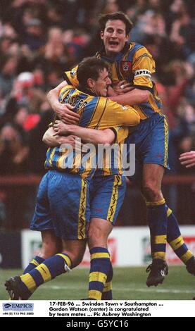 Gordon Watson (centre) is congratulated by team mates Matthew Le Tissier and Richard Hall Stock Photo