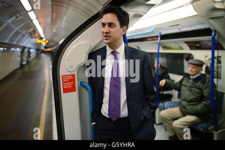 Labour leader Ed Miliband takes the tube back to Westminster after meeting shoppers, market stall holders and restaurants owners in Brixton, south London today. Stock Photo