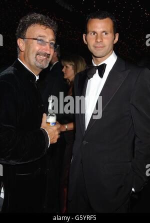 Formula One boss Eddie Jordan and Manchester United footballer Ryan Giggs attending the Cantor Fitzgerald Silverstone Ball 2002 at Stowe School, Stowe to raise funds for The Princess Royal Trust for Carers and CLIC (Cancer & Leukaemia in Childhood). Stock Photo