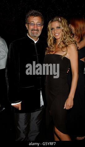 Formula One boss Eddie Jordan and model Jordan attending the Cantor Fitzgerald Silverstone Ball 2002 at Stowe School, Stowe to raise funds for The Princess Royal Trust for Carers and CLIC (Cancer & Leukaemia in Childhood). Stock Photo