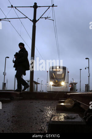 A tram takes a trip along the first section of the Edinburgh tram route to be finished, the 1.7-mile route runs from the tram depot at Gogar to Edinburgh Airport. Stock Photo