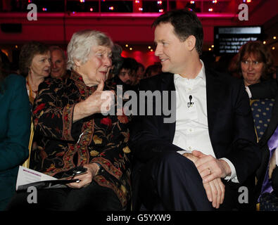 Baroness Shirley Williams (left) and Liberal Democrat leader Nick Clegg take their seats at the opening rally of the Liberal Democrat's Spring Conference at the Hilton Brighton Metropole. Stock Photo