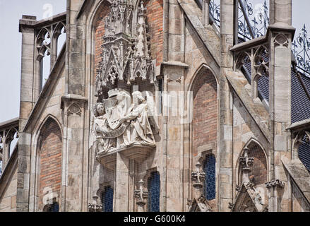 Munich Germany - detail of the facade front piece of the new City Hall in Marienplatz richly decorated in Gothic Revival style Stock Photo