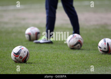 Detail of Charlton Athletic footballs on the pitch during the warm-up Stock Photo