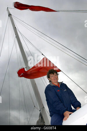 British Yachtswoman Tracy Edwards sits on her 110ft record-breaking yacht, Maiden II near London's Tower Bridge. Tracy and her crew will collect the World Speed Record trophy this week after sailing 694.78 nautical miles in 24 hours last month. * Edwards and her crew were stopped for speeding today - as their catamaran returned to London after breaking the 24-hour world speed record. The13-strong crew were caught breaking the 8 knot speed limit on the River Thames by a police boat. Stock Photo