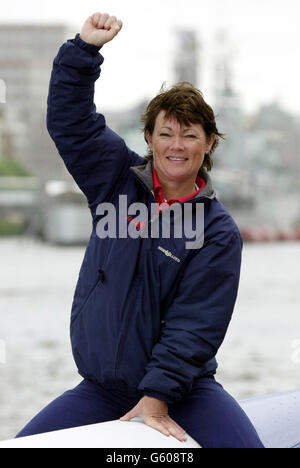 British Yachtswoman Tracy Edwards sits on her 110ft record-breaking yacht, Maiden II near London's Tower Bridge. Tracy and her crew will collect the World Speed Record trophy this week after sailing 694.78 nautical miles in 24 hours last month. * Edwards and her crew were stopped for speeding today - as their catamaran returned to London after breaking the 24-hour world speed record. The13-strong crew were caught breaking the 8 knot speed limit on the River Thames by a police boat. Stock Photo