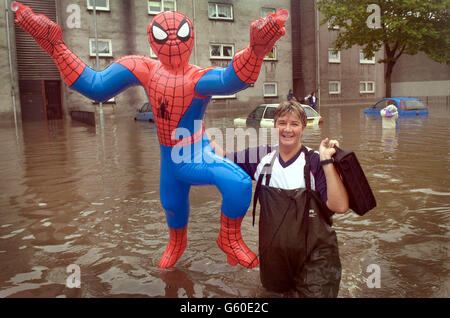 Ally allan braves floods her inflatable spiderman figure hi-res stock  photography and images - Alamy