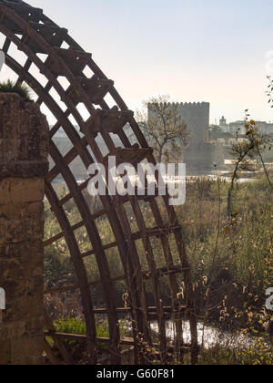 CORDOBA, SPAIN - MARCH 12, 2016:  Replica Moorish Water wheel on the River Guadalquivir Stock Photo