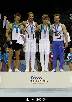 (left to right) Max Whitlock winner of the Silver Medal, Daniel Keatings winner of the Gold Medal and Anthony Wise and Daniel Pervis Winners of the Bronze Medal in the MAG Masters Apparatus Final Pommel, during the British Championships at the Echo Arena, Liverpool. Stock Photo