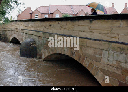 The floodwater rises in Thirsk, North Yorkshire after torrential rain left the area with severe flood warnings. Stock Photo