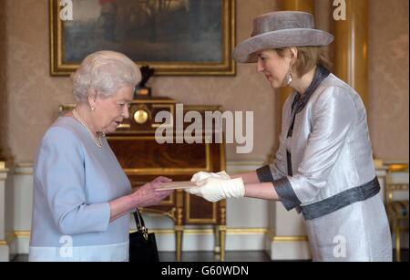 Queen Elizabeth II receives the Ambassador of the Republic of Lithuania, Mrs Asta Skaisgiryte Liauskiene at Buckingham Palace in London where she presented her Credentials. Stock Photo