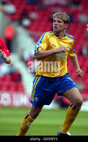 Southampton striker James Beattie in action during the pre-season friendly game between Southampton and FC Utrecht at St Mary's stadium, Southampton. 13/09/02 : Southampton striker James Beattie in action during the pre-season friendly game against FC Utrecht at St Mary's stadium, Southampton. Beattie was today banned from driving for two and half years and fined 10,000 by his club for drink-driving. The 24-year-old, was stopped by police in Southampton and when breathalysed he was found found to have 102 micrograms of alcohol in 100 millilitres of breath the legal limit is 35 micrograms. Stock Photo