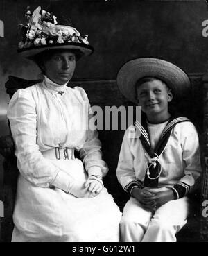 Eight year old Prince John, son of King George V and Queen Mary, poses with his devoted nanny, Lalla Bill, in 1914. Mrs Bill cared for the young prince from birth and became his sole companion when he was moved permanently to Wood Farm in 1917. Stock Photo