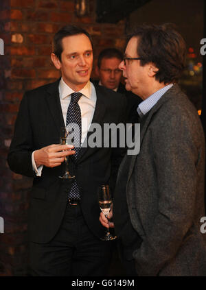 Guests mingle at the Professional Publishers Association Centenary Opening party at the Skyloft, Millbank Tower, London. Stock Photo