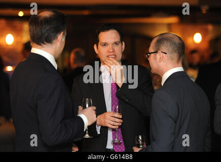 Guests mingle at the Professional Publishers Association Centenary Opening party at the Skyloft, Millbank Tower, London. Stock Photo