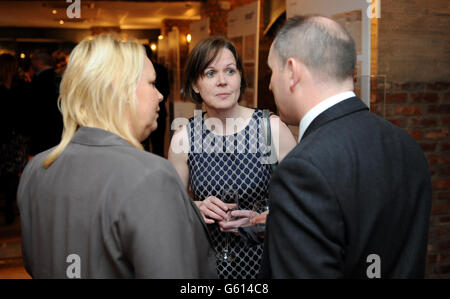 Guests mingle at the Professional Publishers Association Centenary Opening party at the Skyloft, Millbank Tower, London. Stock Photo