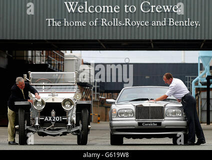 The Rolls-Royce Corniche (right) receives some finishing touches from Karl Shirley, alongside the 1907 Silver Ghost cared for by Michael Edge, as the last ever Rolls-Royce to be built at the luxury car-maker's plant at Crewe leaves the production line. * The event marks the end of 56 years of Rolls-Royce production at the Cheshire plant. The cars will now be made by BMW in West Sussex. The last Rolls-Royce car to be made at Crewe was a unique two-door Silver Storm convertible Corniche, which will remain the property of the Crewe factory. Stock Photo