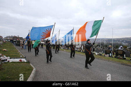 A colour party parades as members of the 32 County Sovereignty Movement gather for their Easter commemoration at the City Cemetery in Derry. Stock Photo