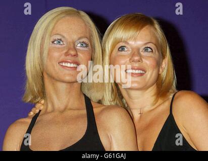 Pop singer Geri Halliwell comes face-to-face with her new waxwork double during a photocall at Madame Tussaud's. It is Geri's first wax figure - The Spice Girls were modelled after Geri had left the group. Stock Photo