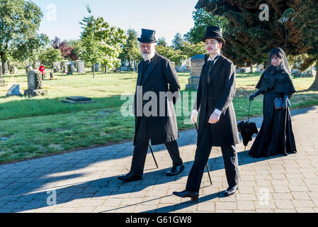 Mourners in traditional black costume, Mountain View Cemetery, Vancouver, British Columbia, Canada, Stock Photo