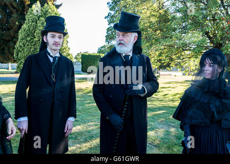 Costume Society members dressed in traditional mourning attire  at Summer Solstice Celebration,  Mountain View Cemetery, Vancouv Stock Photo