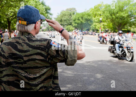 Washington, DC USA, May 29th, 2016: Supporter saluting during Memorial Day Weekend Rolling Thunder Ride Stock Photo