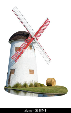 Windmill and straw in the lawn waterfront isolated on white background Stock Photo