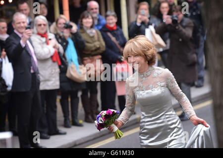 Coronation Street actress Helen Worth, who plays Gail Platt in the popular television soap opera, arrives at St James Church in London for her wedding to Trevor Dawson. Stock Photo