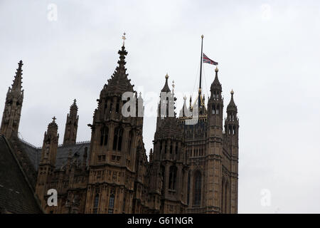 The Union flag flies at half mast over the Houses of Parliament, London, the day after the death of Baroness Thatcher. Stock Photo
