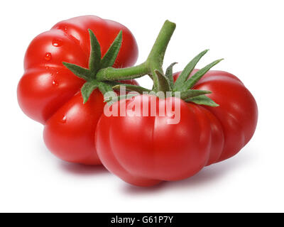 Ripe heirloom Tomatoes on vine, Togorific variety (Solanum lycopersicum). Clipping paths for both tomatoes and shadow,infinite d Stock Photo