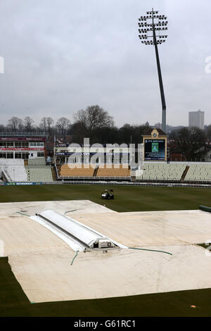 Covers on the pitch delay the start of third day of the LV=County Championship Division One match between Warwickshire v Derbyshire at Edgbaston, Birmingham. Stock Photo